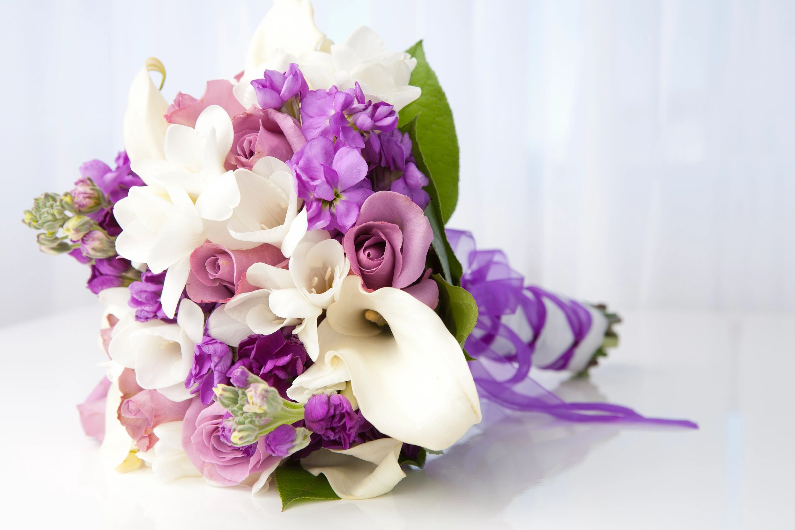 Purple and white bouquet arrangement